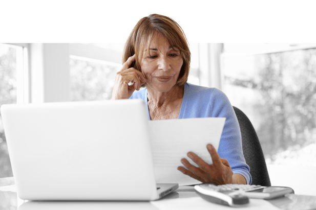 senior-hispanic-woman-working-in-home-office-color drench